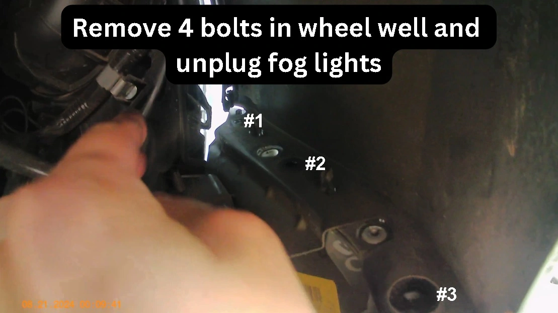 Remove these 3 bolts in wheel well